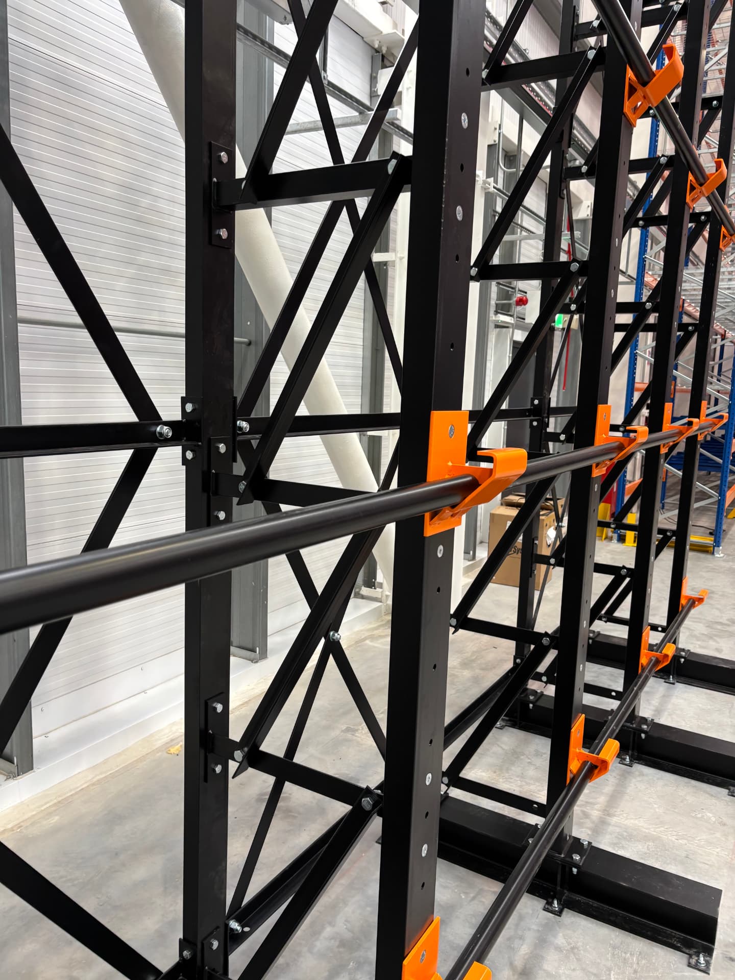 Close-up of coil racking cradles holding coil bars